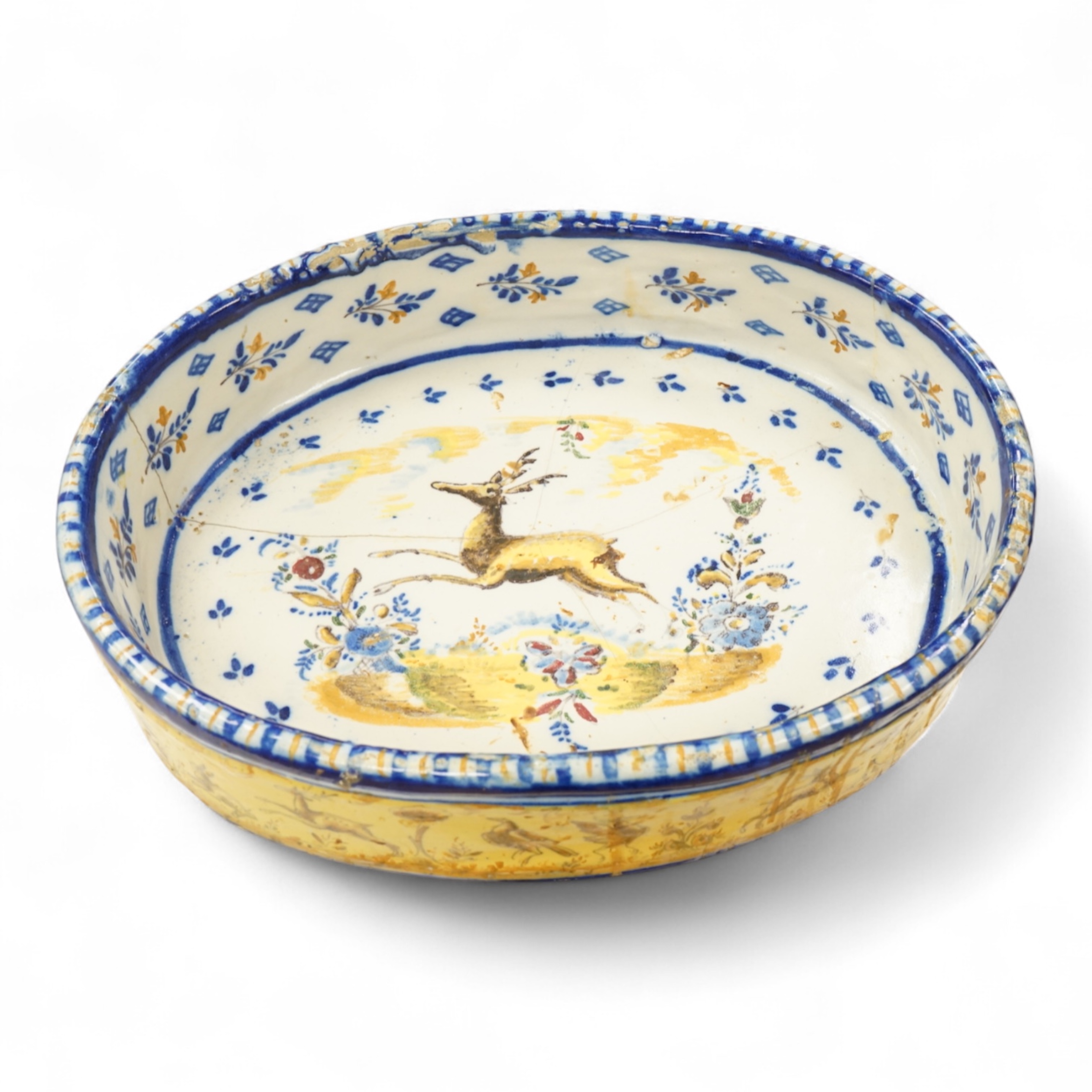 An early 20th century French faience oval footed dish, 44cm